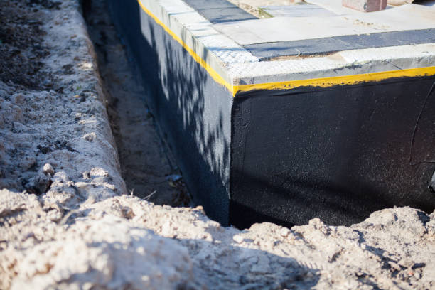 Professional Waterproofing technician working in Lynchburg, TN